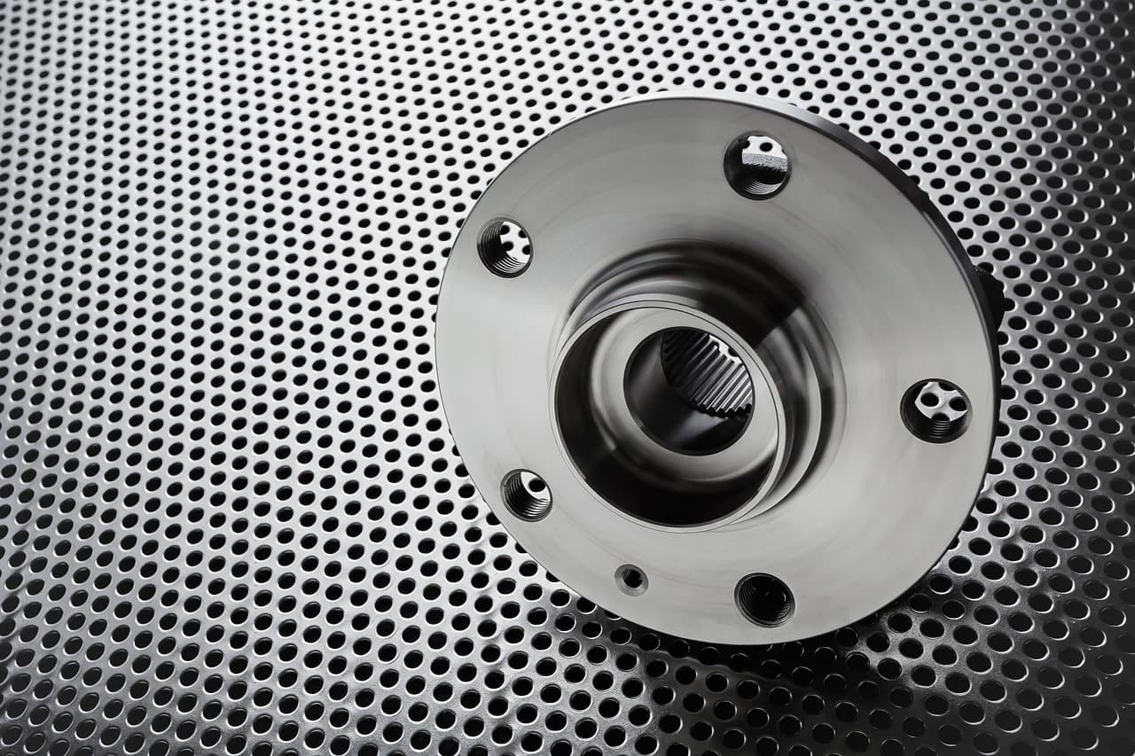 A new wheel hub on a perforated steel bench